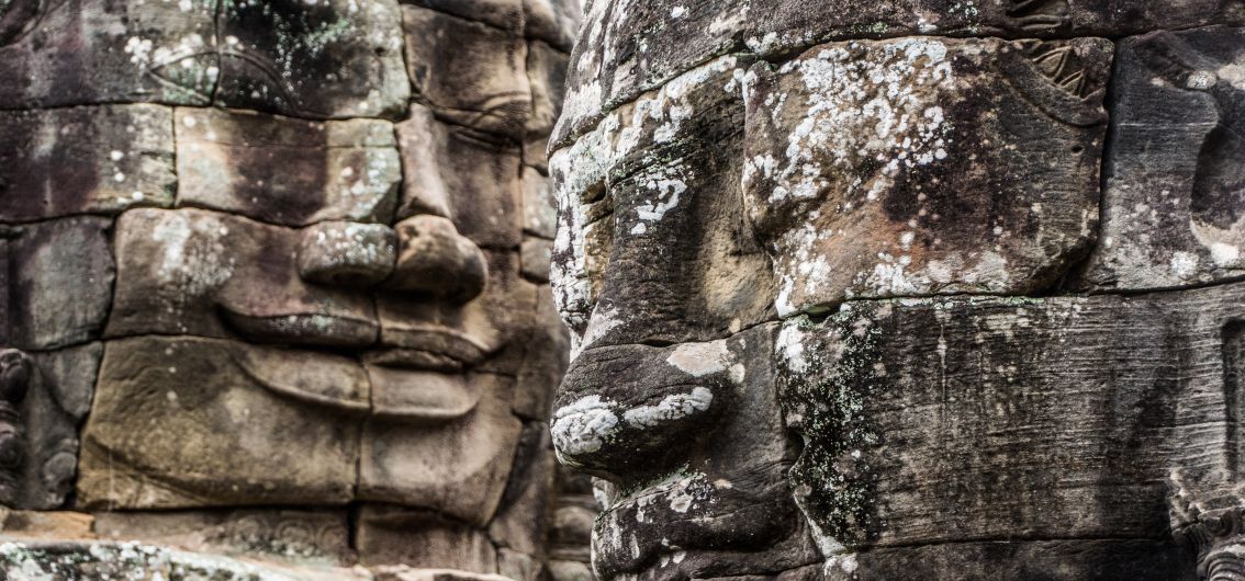 Per E-Bike durch Kambodscha - Steingesichter des Bayon Tempels ind Sieam Reap Per E-Bike durch Kambodscha - Steingesichter des Bayon Tempels ind Sieam Reap